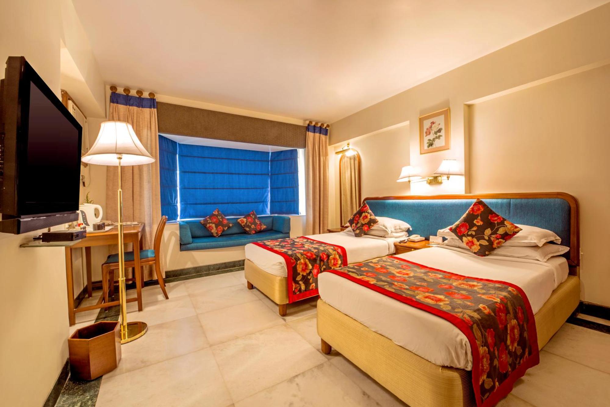 Hotel Parle International Mumbai Quarto foto